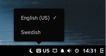 Night Light and Keyboard layout applets added to a panel in Solus