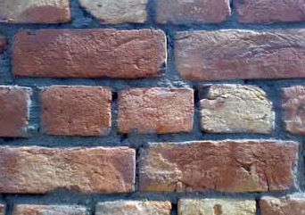 Header bricks in a solid brick wall