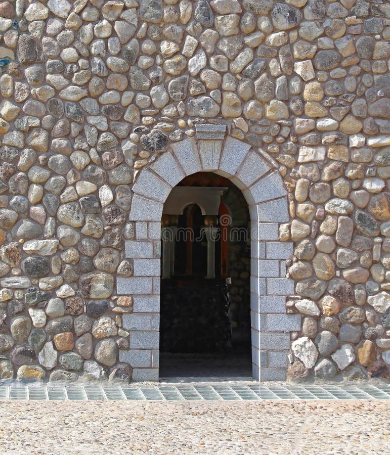 Arch Doorway. Stone House Exterior With Arch Doorway royalty free stock photos