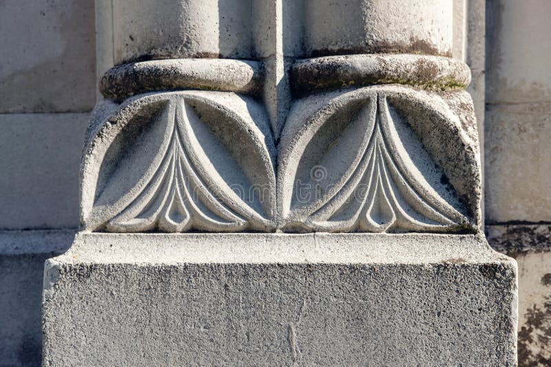 Old stone column plinth or bottom. Architectural detail, old stone column plinth or bottom stock photo