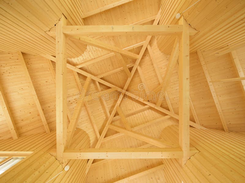 Ceiling with geometric pattern of wooden beams royalty free stock images