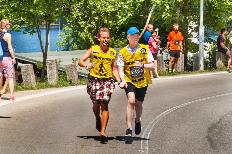 Charitable run `RunTour-Brno` in the dam area. Run to support the Foundation for the Blind. BRNO, CZECH REPUBLIC -27 MAY, 2017: Charitable run `RunTour-Brno` in stock photo