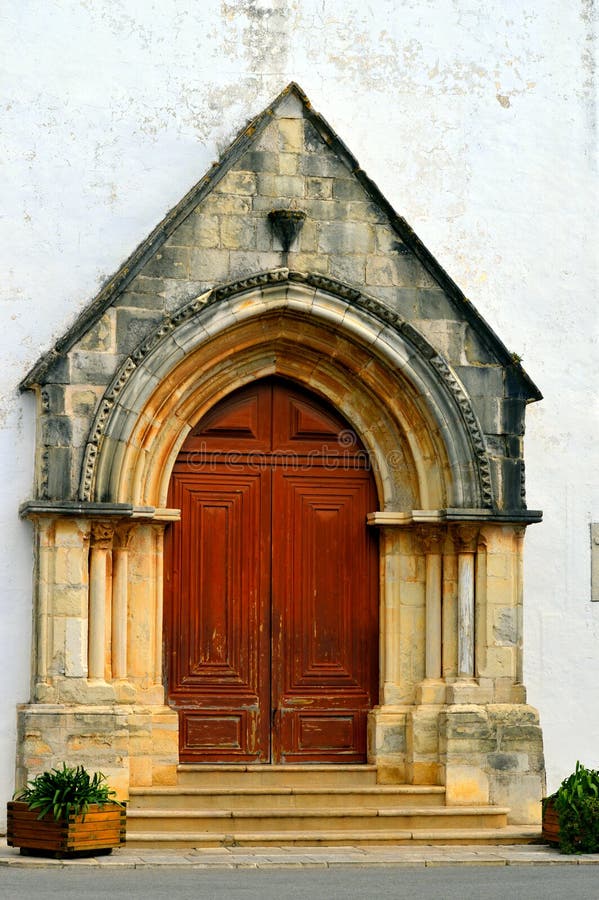 Church of St. Clement. Gothic style church originally built in the 13th century with pointed arch doorway on the facade. Church of St. Clement. Gothic style stock images