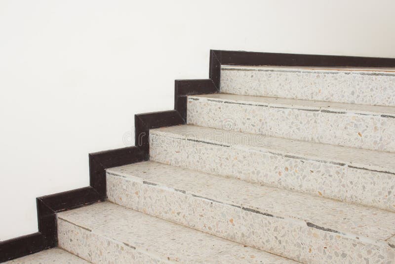 Close up Stairs terrazzo,marble floor in sideways of a wall.  stock images