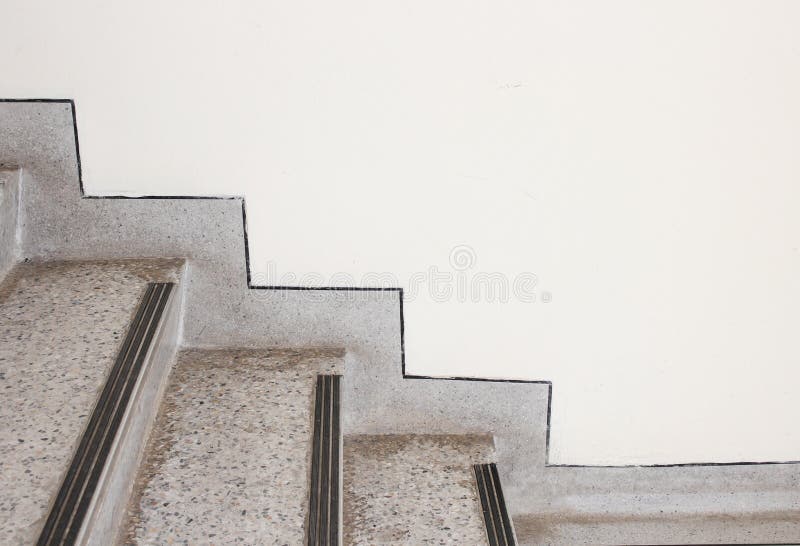 Close up Stairs terrazzo,marble floor in sideways of a wall.  royalty free stock photos