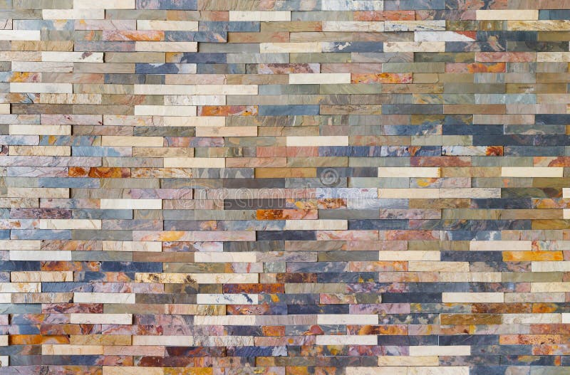 Colorful stone wall tiles. Close up colorful stone wall tiles decoration in living room royalty free stock photo