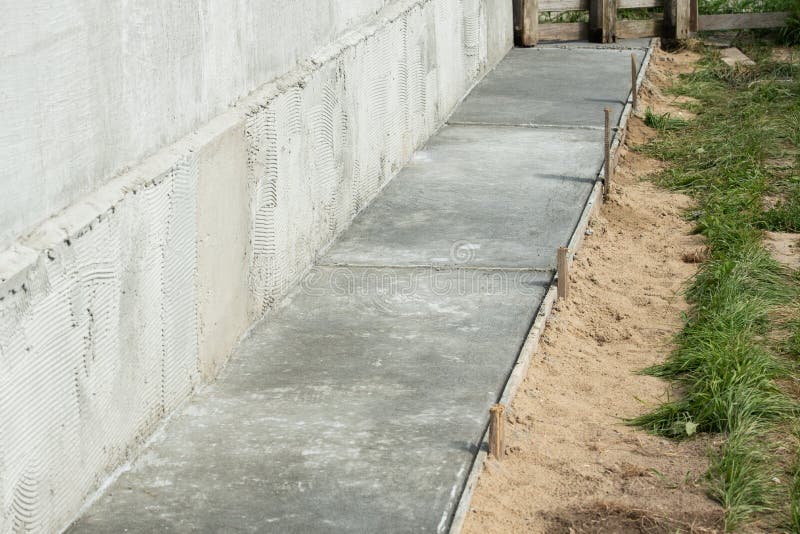 Concrete blind area along the house. Concrete blind area along the recently built house royalty free stock photos