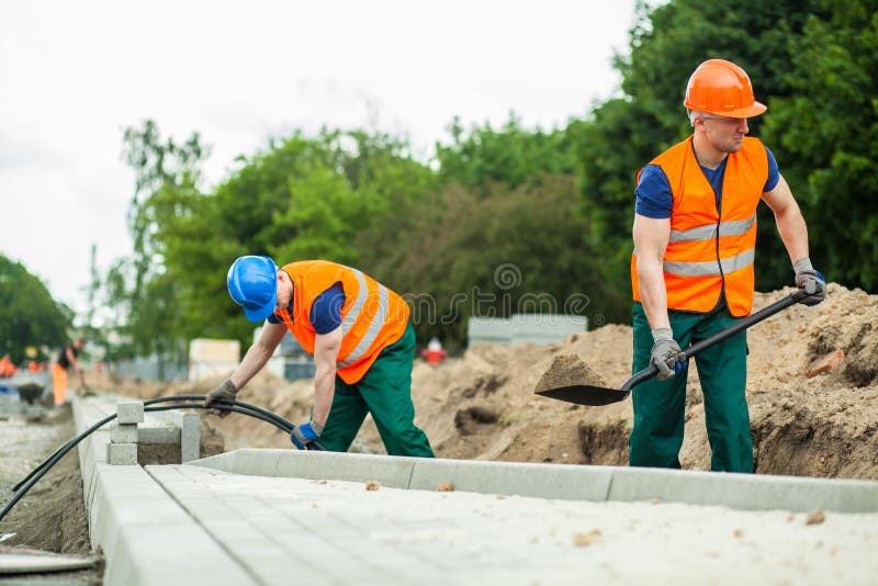 Construction workers during their work stock photo