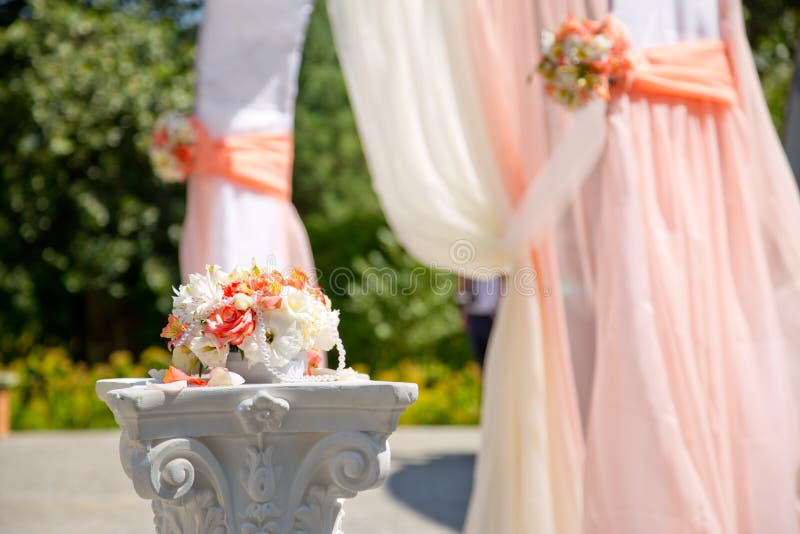 Decorative element of a wedding arch at a wedding ceremony. Floristic composition stock photos
