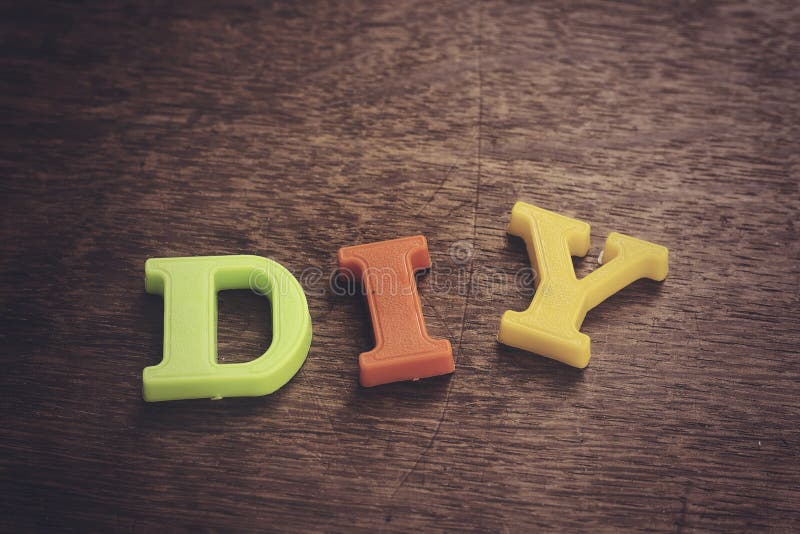 Diy plastic letters, do it yourself concept stock image