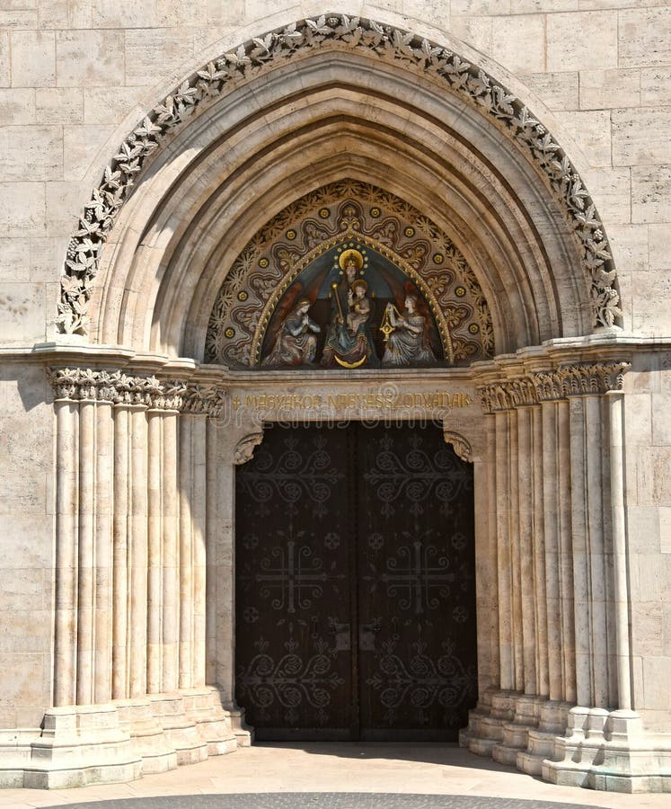 Doorway and arch of Matthias church in Budapest. Details of doorway and surrounding arch into Matthias church in the castle district of Budapest, capital of stock photos