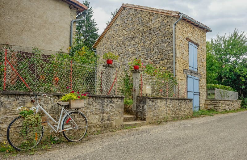 Facade of a rustic village house stock photo