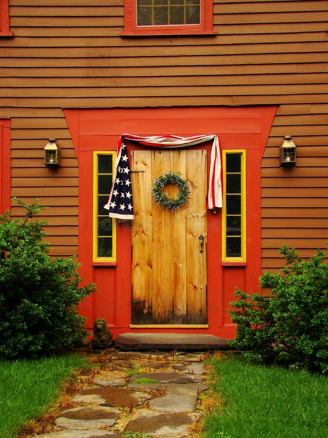 Front Door. A front door and decor on an old colonial home royalty free stock image