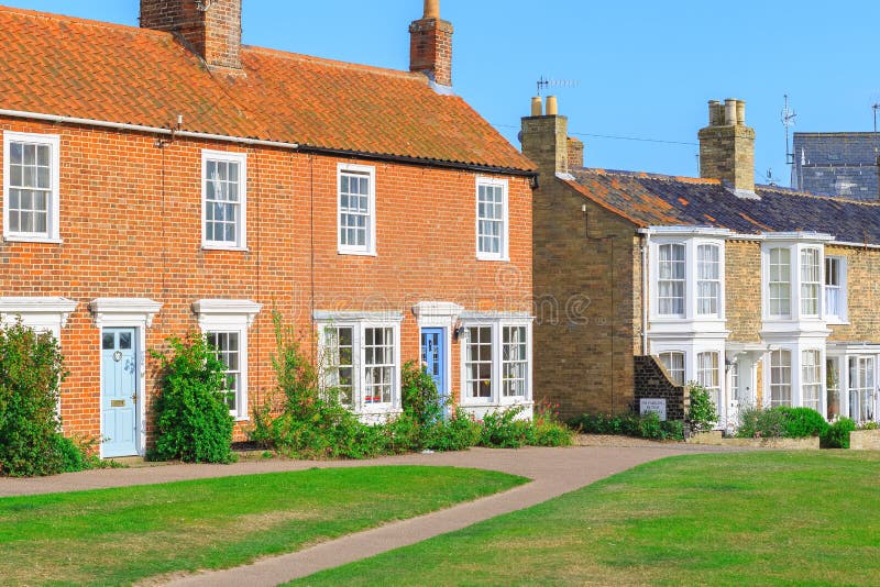 Holiday brick cottages in Southwold, a popular seaside town in the UK. Old fashioned holiday brick cottages in Southwold, a popular seaside town in the UK royalty free stock photography