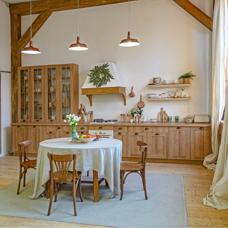 The interior of the kitchen in a rustic style, Scandinavian style. Wooden facades of cabinets. Nice sunny morning royalty free stock photos