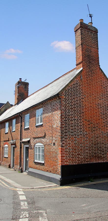 Little red brick kent cottages. Photo of two red brick kent cottages located in the historic town of faversham. photo taken 3rd june 2013 royalty free stock images