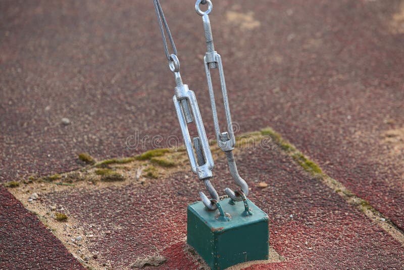 Metal cable fastening engineering structure. On the street stock photos