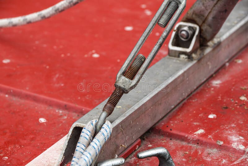 Metal fastening of two steel cables. Metal tie stock photography