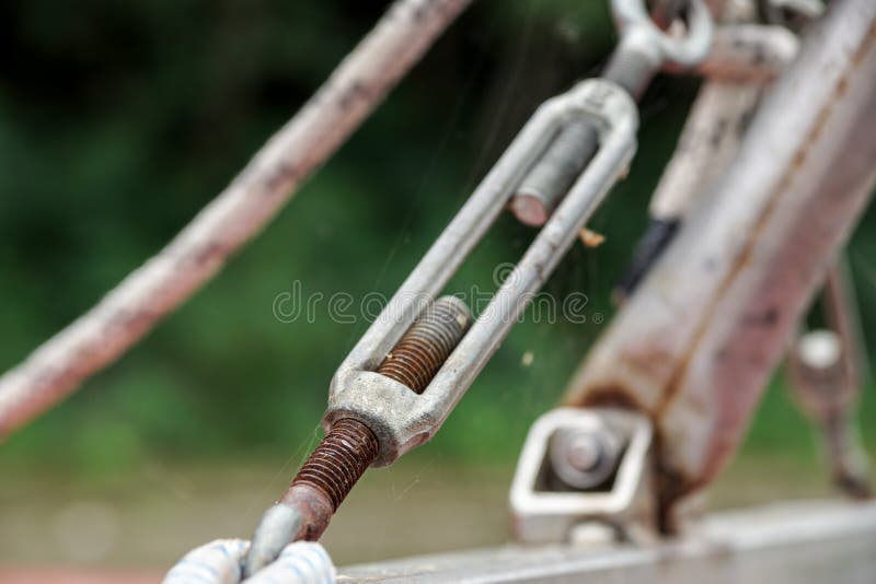 Metal fastening of two steel cables . Metal tie stock photo