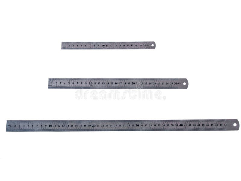 Metal rulers, different length -20,30,50 cm. Convenient and easy to use royalty free stock photos