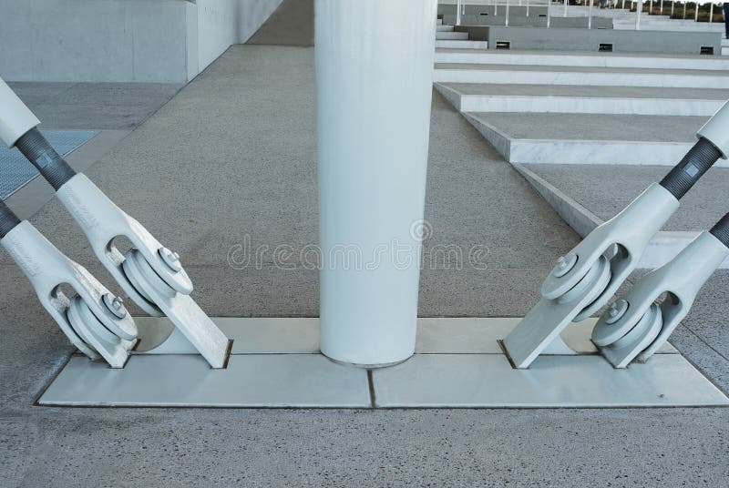 Metal white fastening. In an architectural building stock image