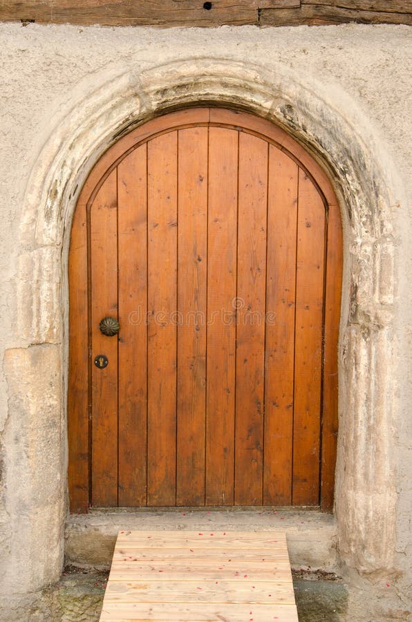 Old wooden front door, Tuebingen, Germany. Old wooden front door in Tuebingen, Bavaria, Germany royalty free stock photo
