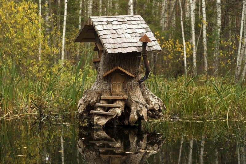 House of fabulous creatures in the swamp. Rerm, Russia - Octoder 02, 2018: art object - house of fairy creatures in stump on the swamp royalty free stock images