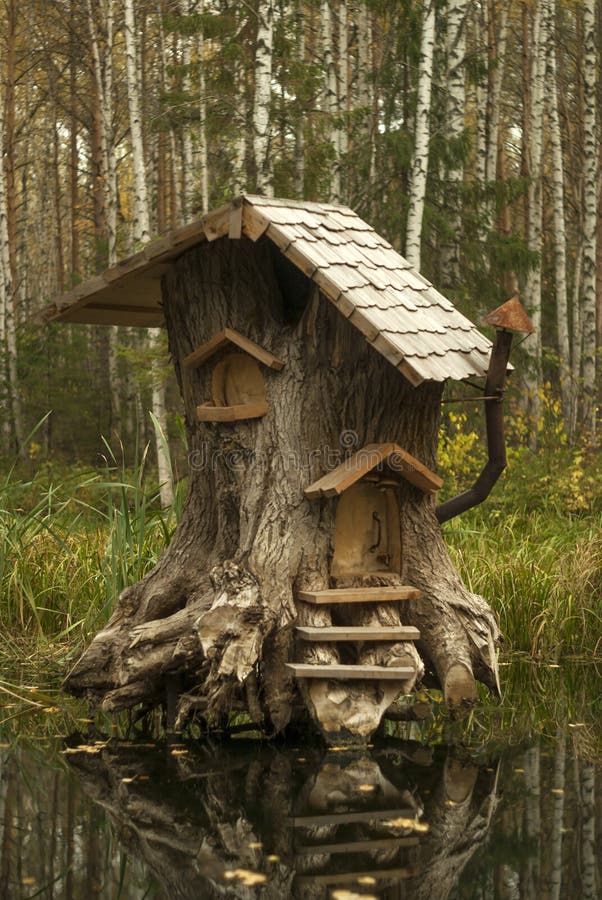 House of fabulous creatures in the swamp. Rerm, Russia - Octoder 02, 2018: art object - house of fairy creatures in stump on the swamp royalty free stock photos