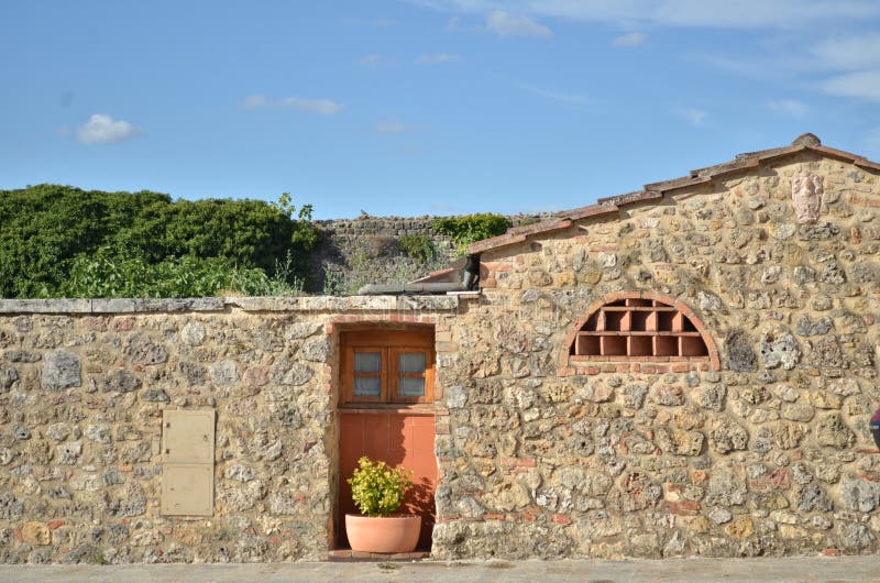 Rustic house facade in tuscany, italy stock photography