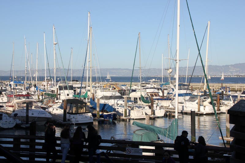 San Francisco Bay Pier 39 with ships and boats,. Important tourist destination with board watch, seal watching and view of Alcatraz Island stock image