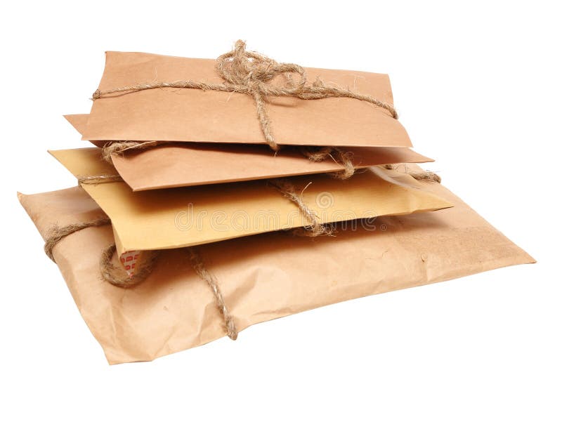 Shipping boxes isolated on white. Brown shipping parcel tied with twine on white royalty free stock photos