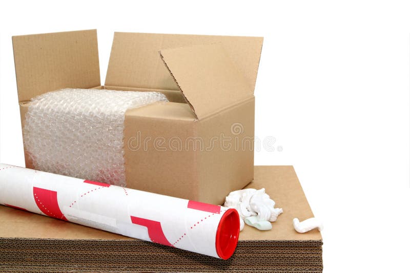 Shipping Stuff. Cardboard cartons, tube, bubble wrap, styrofoam packing peanuts royalty free stock image