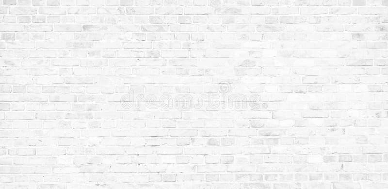 Simple white brick wall with light gray shades seamless pattern surface texture background in banner wide panorama royalty free stock image