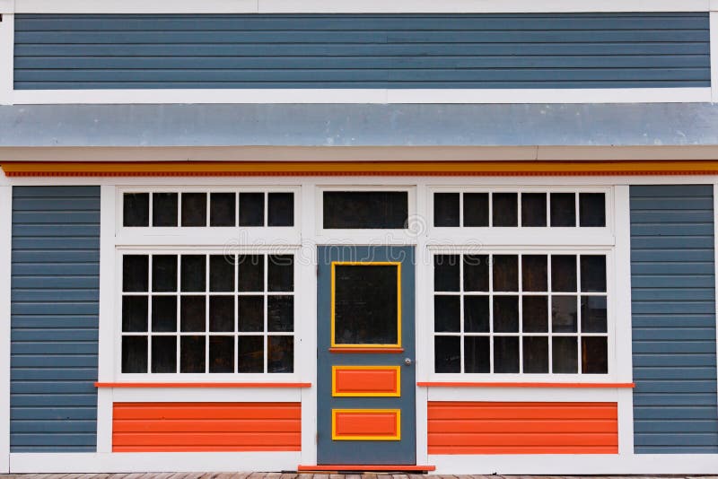 Small store front entrance colorful wooden house royalty free stock images