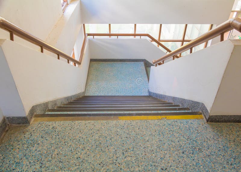 Stairs blue old terrazzo floor walkway down Inside the building. select focus with shallow depth of field.  royalty free stock photos