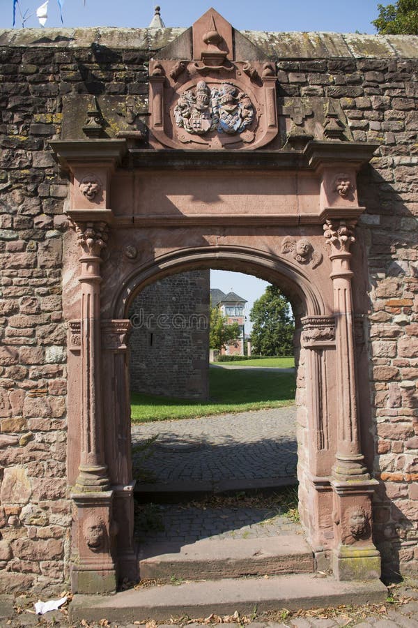 Stone brick wall and arch gate at Lobdengau Museum. Stone brick wall and arch gate for travelers people entrance go to visit Lobdengau Museum at Ladenburg town stock photos