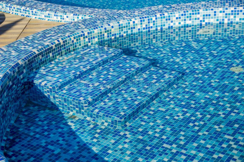 Swimming pool with blue mosaic stock photo