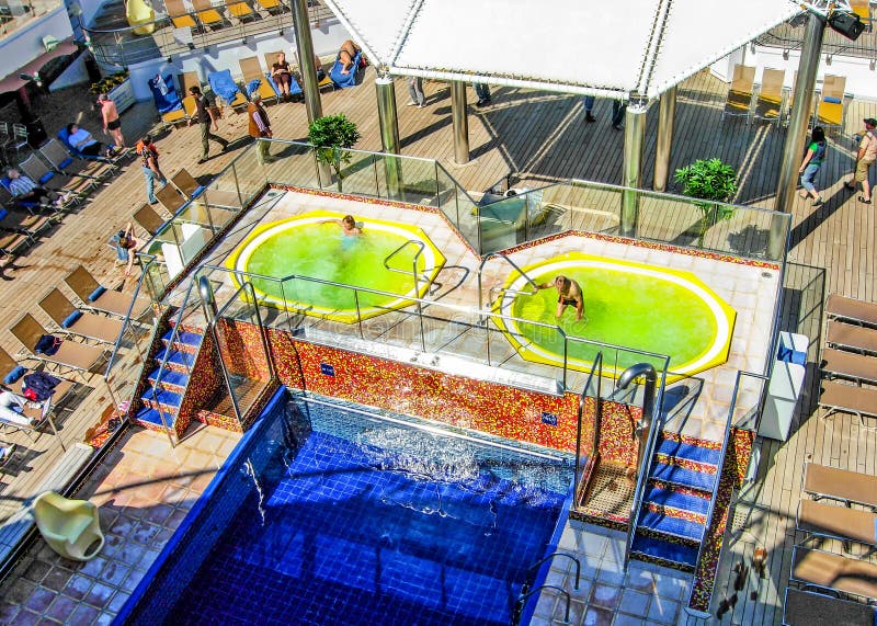 Swimming pool and whirlpools on board the cruise ship Costa Magica. On the Baltic Sea  - June 1, 2009: Swimming pool and whirlpools on board the cruise ship stock image
