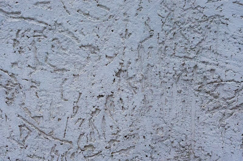 Texture of the decorative stucco wall as a background. Bark beetle style stock photography