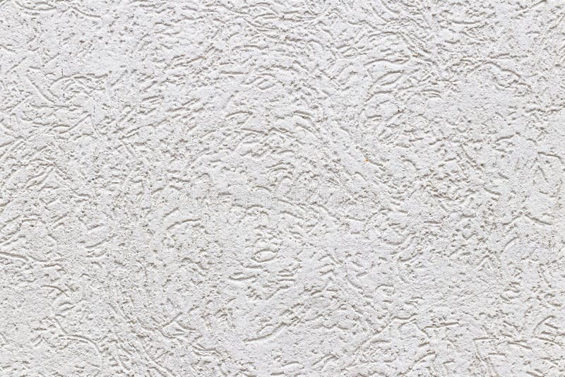 Texture of a fragment of a wall of a modern structure of white color. Harshness in the style of bark beetle.A background for desig. N and creative work stock photos