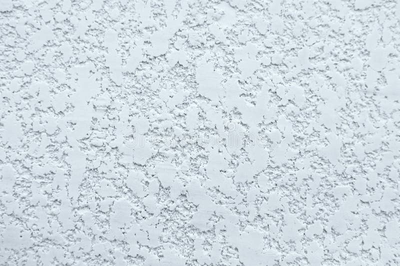 Texture of white wall with plaster pattern. Textured backdrop, design repair, bas-relief. House repair, exterior design concept stock photo