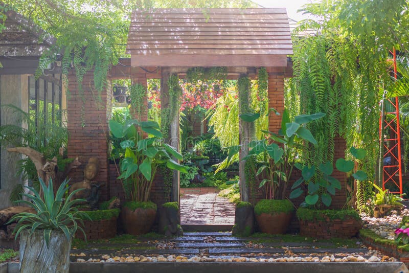 Traditional wooden gateway. A traditional wooden gateway entrance to garden stock photos