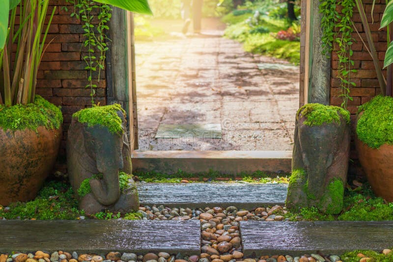 Traditional wooden gateway. A traditional wooden gateway entrance to garden stock photo