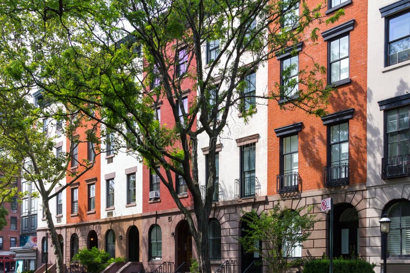 Tree Line Stree in Manhattan New York City. Tree Lined Block of Apartment Buildings in Manhattan, New York City stock photos