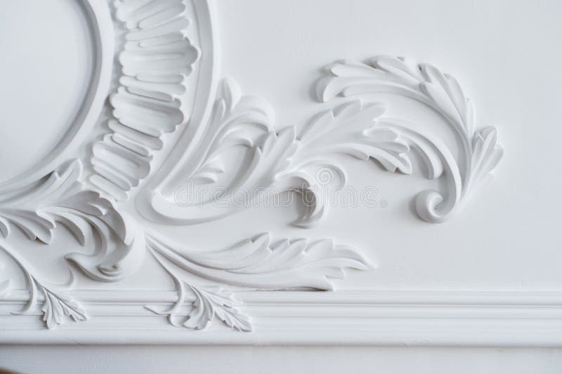 White wall molding with geometric shape and vanishing point. Luxury white wall design bas-relief with stucco mouldings stock photos