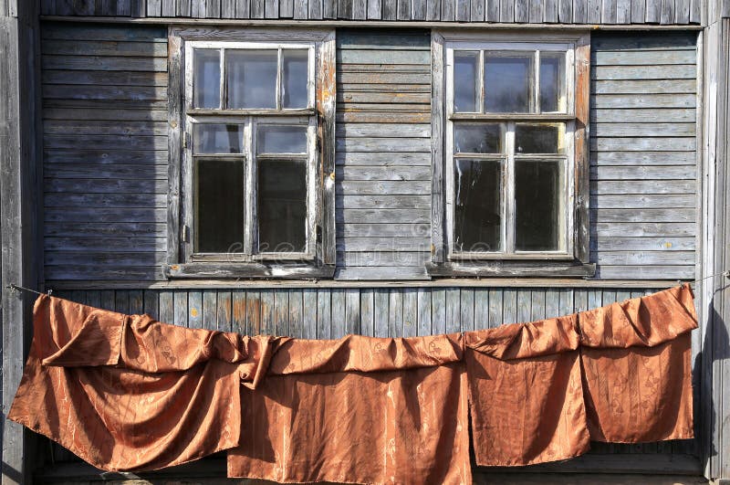 Windows in an old wooden house stock image