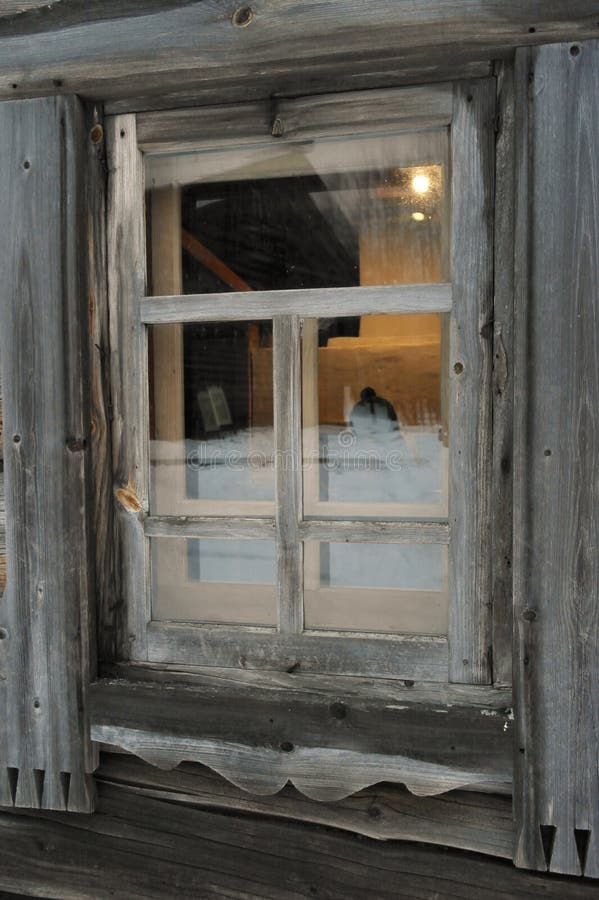 Windows of an old, wooden house royalty free stock photo