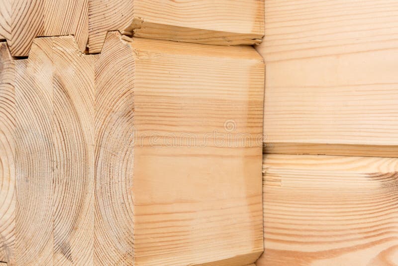 Wood Glued timber close up. Wooden grain timber end background. Glued pine timber beams. Wood for building a house. Building royalty free stock photo