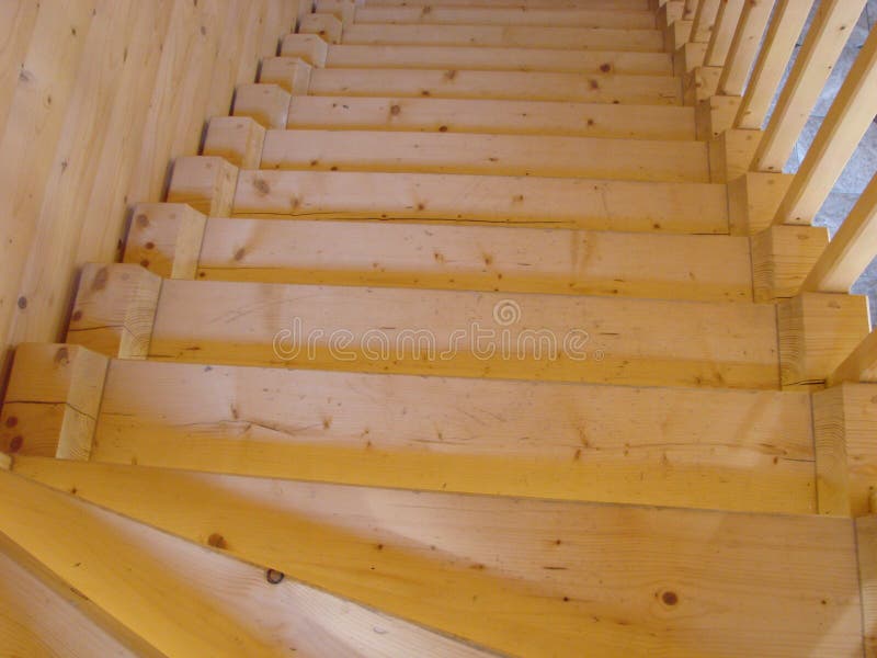 Wooden interior staircase to second floor royalty free stock photo