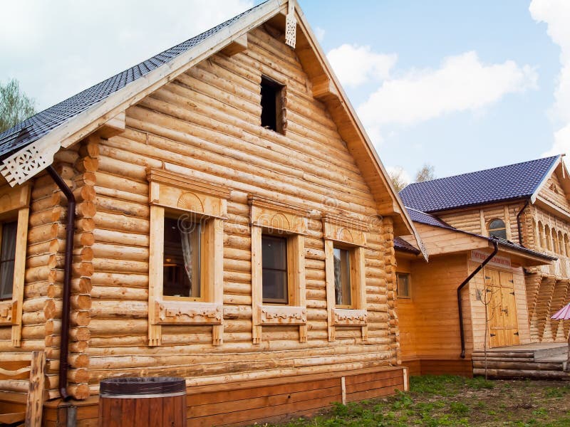 Wooden log house in Russian village in the middle Russia. As a symbol of rural healthy life, cosiness and fresh air stock photo